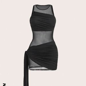 Sexy black mini dress. Never worn